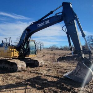 Excavator on field